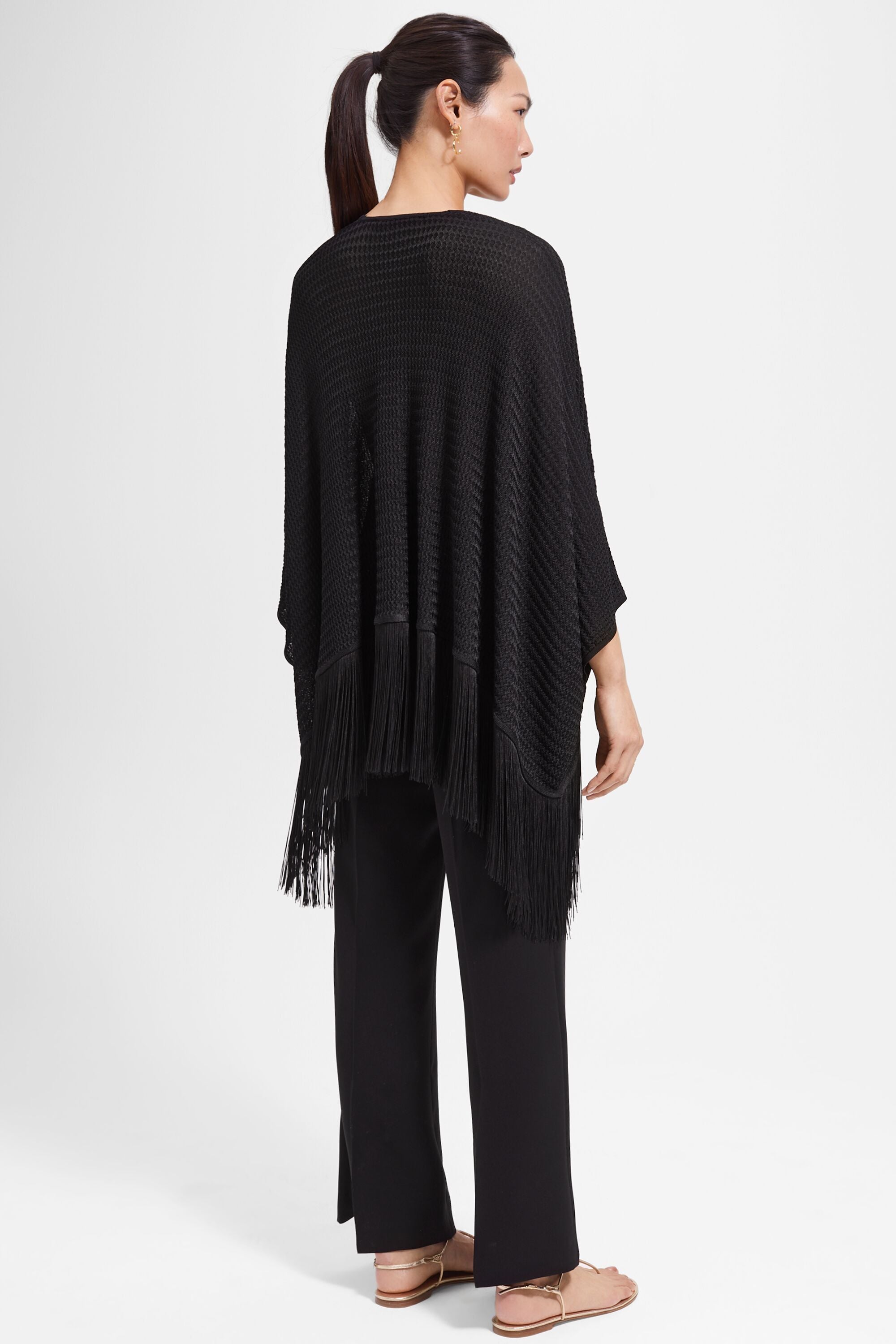 Fringed openwork knit oversized poncho black - CH Carolina Herrera