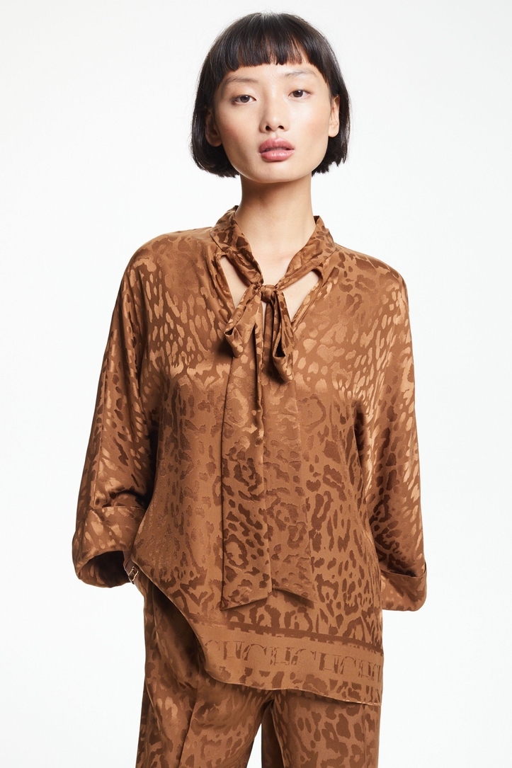 Top oversize de jacquard de seda con lazo