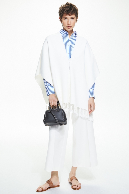 PONCHO OVERSIZE CON PUNTO CALADO Y FLECOS