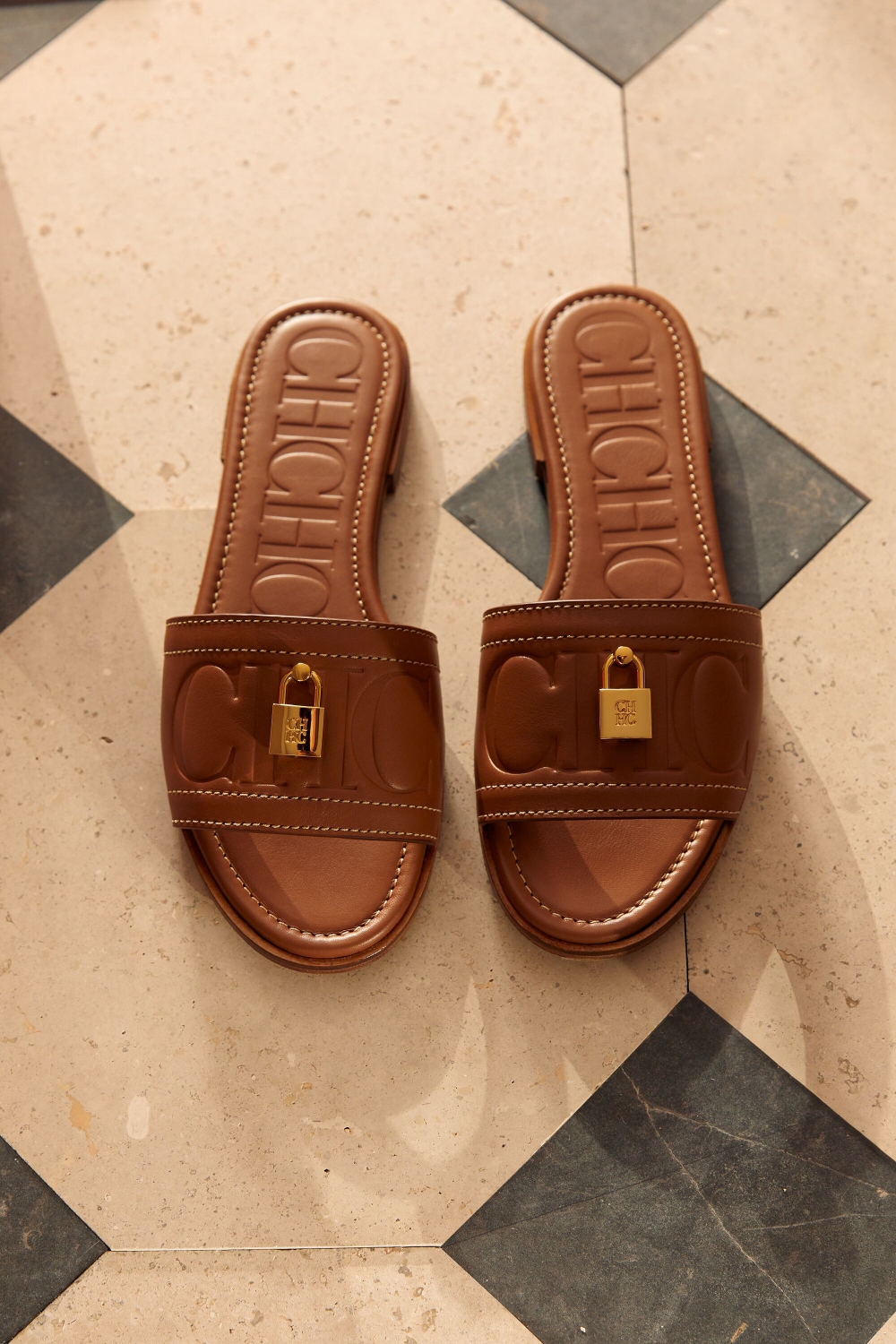 FACTORY LOCKED LEATHER SLIDES