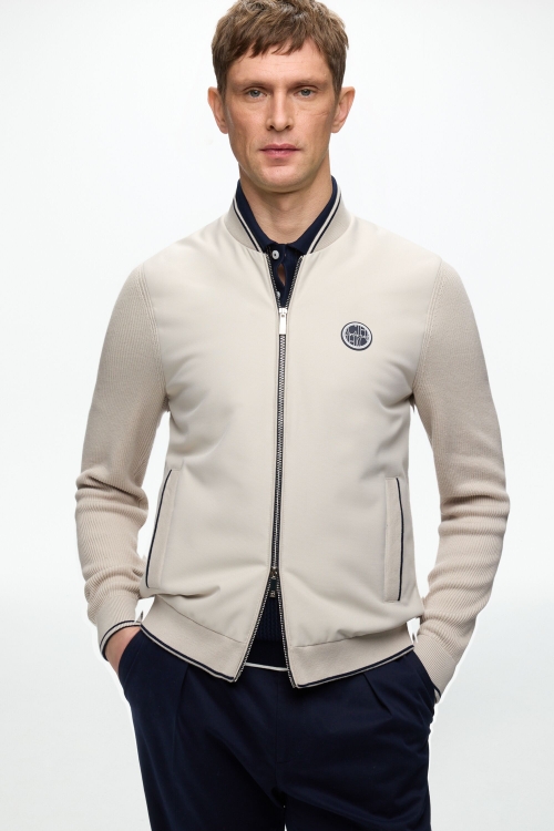 KNIT AND TEXTURED NYLON BOMBER JACKET