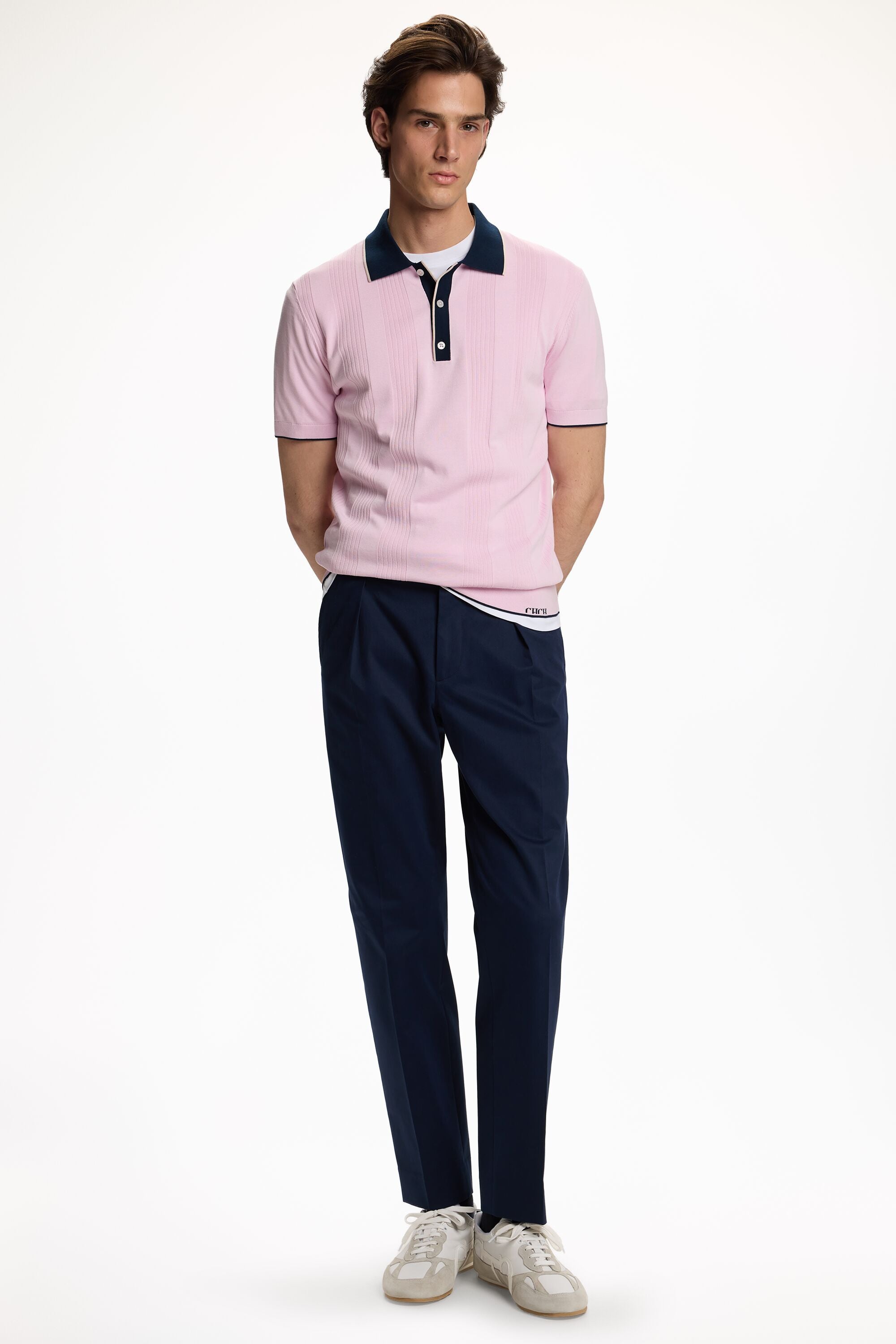 pink dress shirt navy blue pants 10 a navy pantsuit with cropped pants, a pink shirt and blue shoes for a professional look