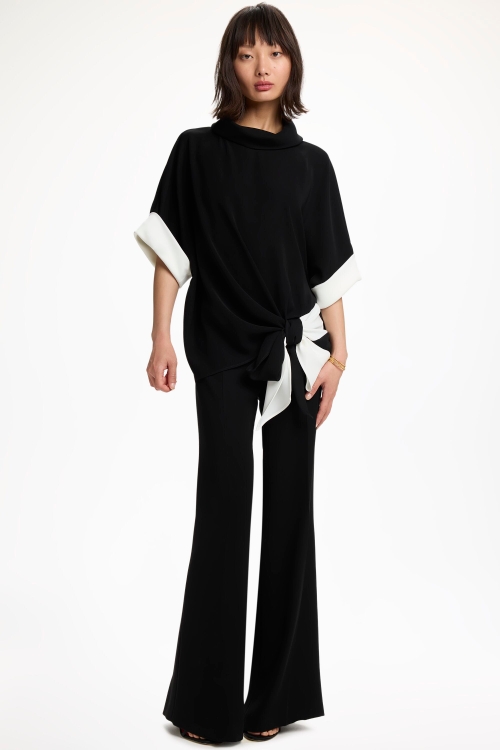 CREPE FLARED PANTS WITH JEWEL BUTTONS